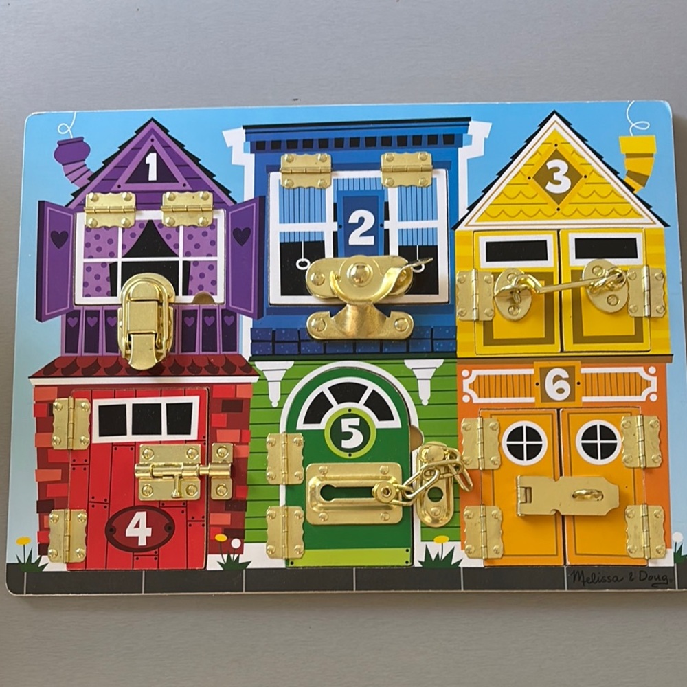 Melissa & Doug Colorful Latches Activity Board